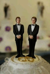 male dolls on a cake